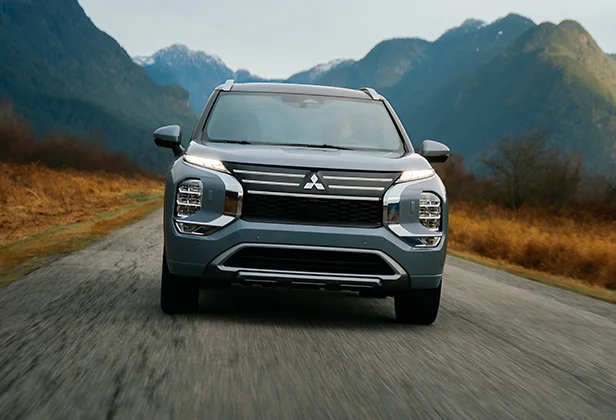 Certified pre-owned Mitsubishi vehicle parked at dealership